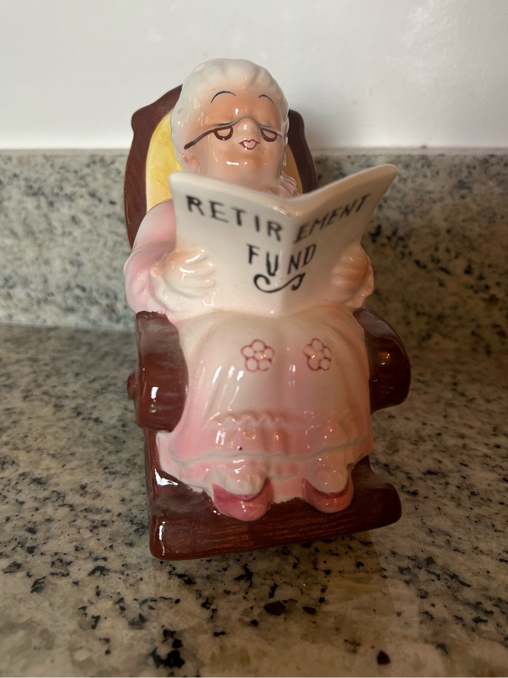 VintageCeramic Grandma Figurine Reading 'Retirement Fund' - piggy bank